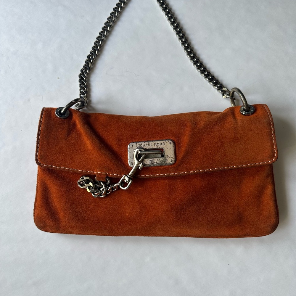 Michael Kors Orange Wristlet with Sleek Design
